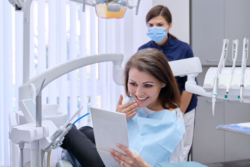 a dental veneer patient smiling after procedure.