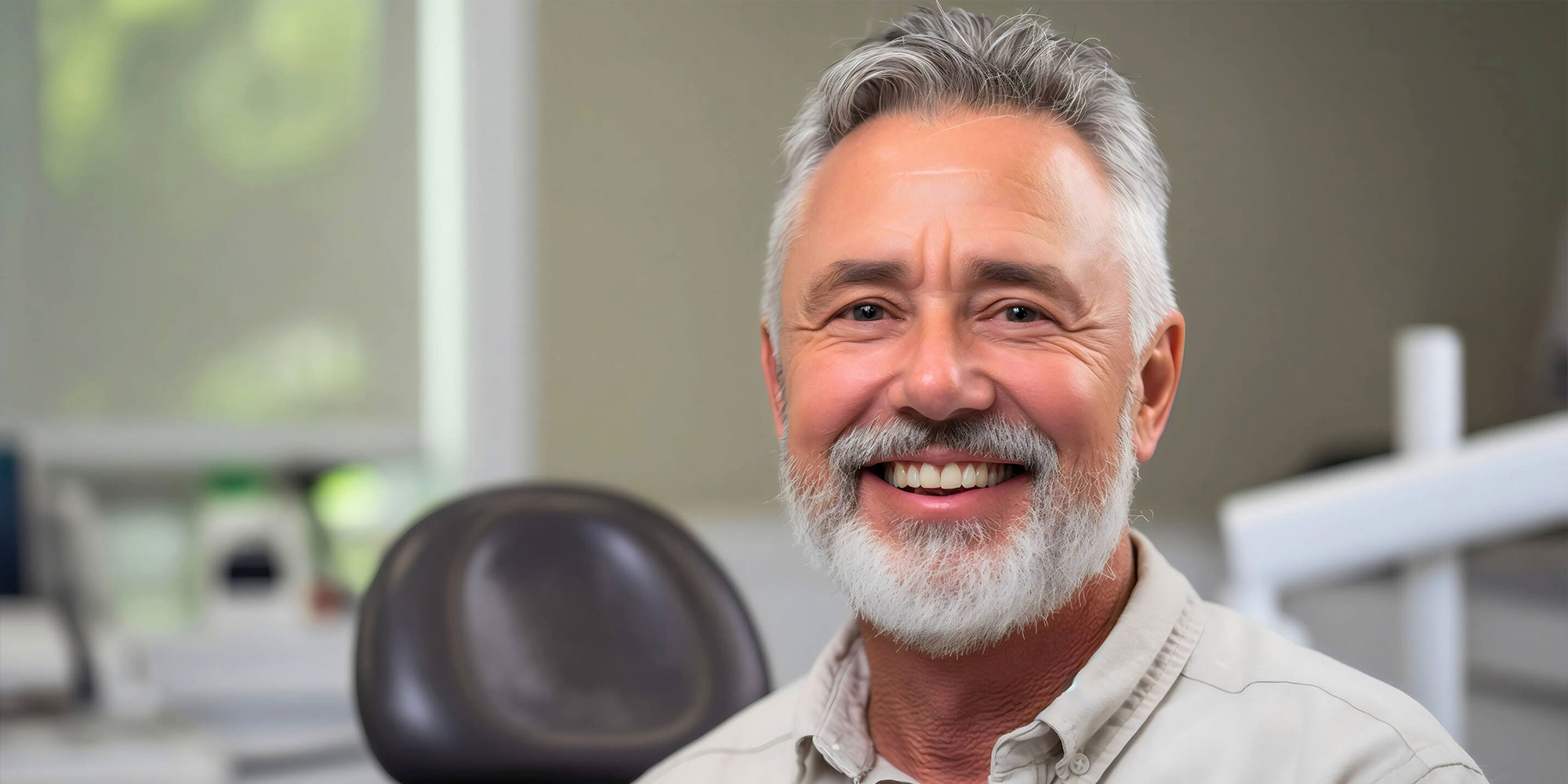 patient smiling after dental laser procedure